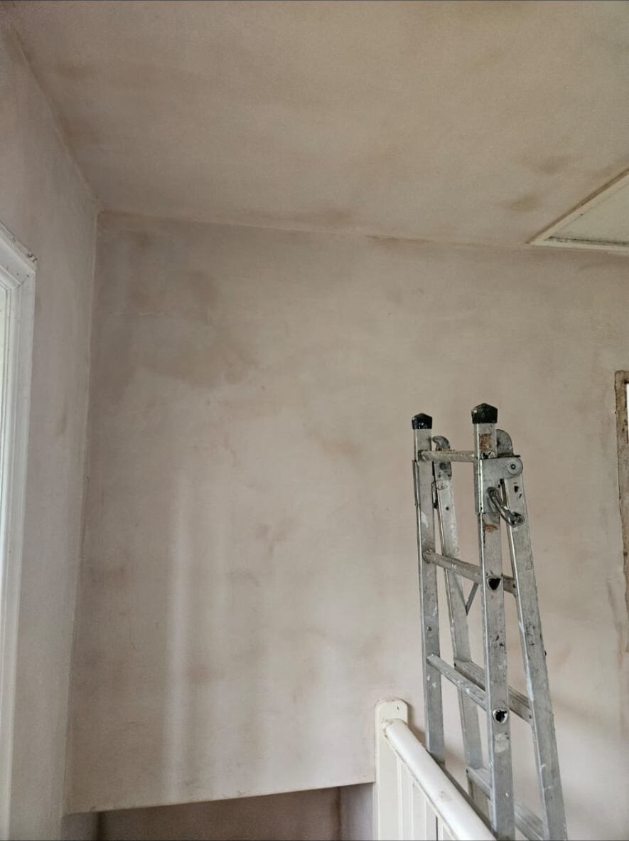 Stairwell wall plastering by D Whitley Plastering