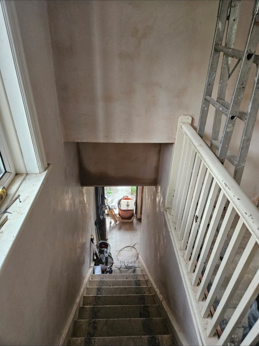 Freshly skimmed stairwell by D Whitley Plastering
