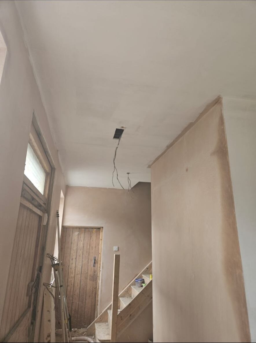 Stairwell plastering by D Whitley Plastering